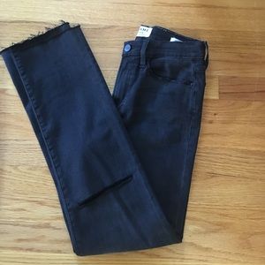 FRAME Le High Straight distressed dark grey jeans.